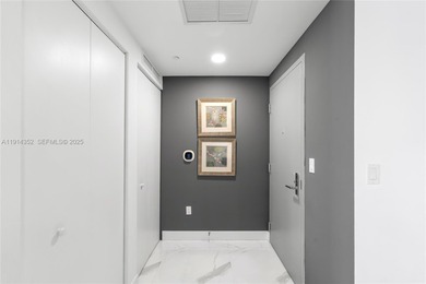 Welcome to Unit 4309 at Aria on the Bay -- a bright and spacious