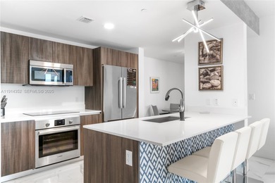 Welcome to Unit 4309 at Aria on the Bay -- a bright and spacious