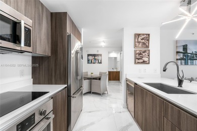 Welcome to Unit 4309 at Aria on the Bay -- a bright and spacious