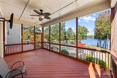 Discover the ultimate in LAKEFRONT LUXURY! Stunning 2.5-story