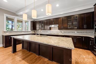 Discover the ultimate in LAKEFRONT LUXURY! Stunning 2.5-story