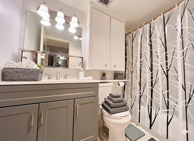 Just footsteps from the pool, this beautiful corner unit