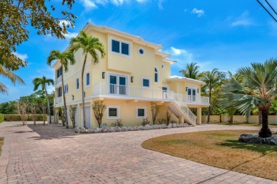 Stunning 4-Story Mediterranean Estate in Exclusive Stirrup Key -