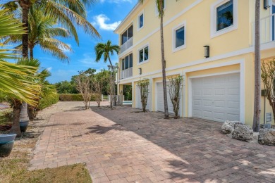 Stunning 4-Story Mediterranean Estate in Exclusive Stirrup Key -