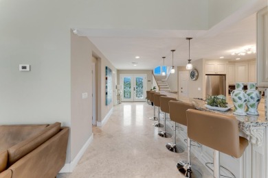 Stunning 4-Story Mediterranean Estate in Exclusive Stirrup Key -