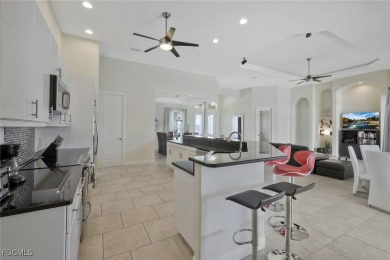 Discover the ultimate Florida lifestyle in this immaculately