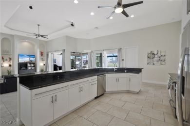 Discover the ultimate Florida lifestyle in this immaculately