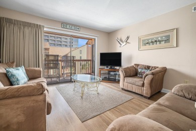 Located along the famous Golden Mile, this beautifully updated