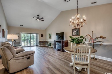 Welcome to this beautifully upgraded top-floor condo in an