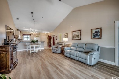 Welcome to this beautifully upgraded top-floor condo in an