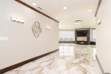 Experience luxury high-rise living in this stunning 4-bedroom