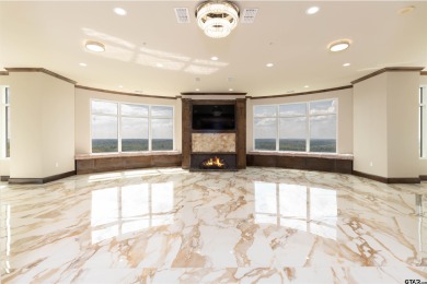 Experience luxury high-rise living in this stunning 4-bedroom