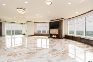 Experience luxury high-rise living in this stunning 4-bedroom