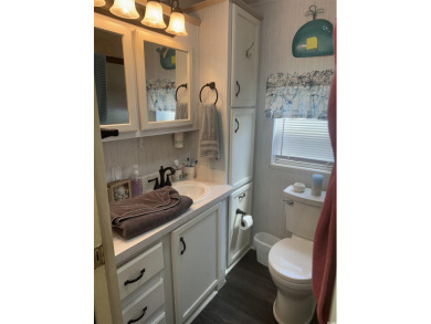 Beachside Living Made Easy with a motivated seller! Discover