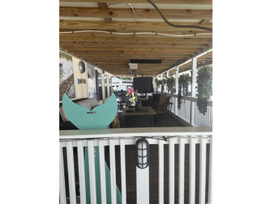 Beachside Living Made Easy with a motivated seller! Discover