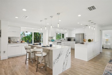 Welcome to this beautifully renovated executive residence