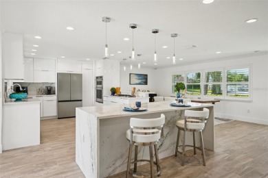 Welcome to this beautifully renovated executive residence