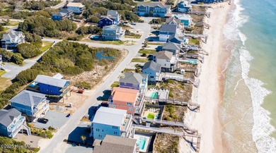 This beautiful 2nd row Ocean and Sound View lot is shovel ready