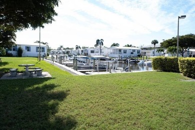 Discover Easy Coastal Living in Naples Land Yacht Harbor This
