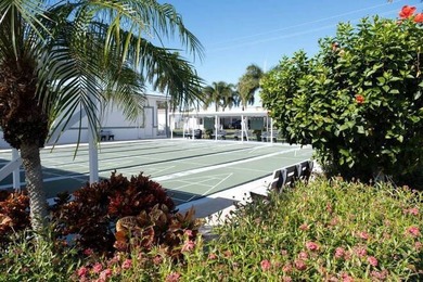 Discover Easy Coastal Living in Naples Land Yacht Harbor This