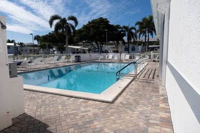 Discover Easy Coastal Living in Naples Land Yacht Harbor This
