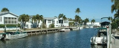 Discover Easy Coastal Living in Naples Land Yacht Harbor This