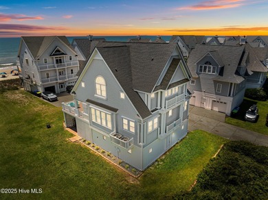 This exquisite, fully furnished oceanfront home in the coveted