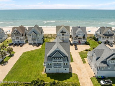 This exquisite, fully furnished oceanfront home in the coveted