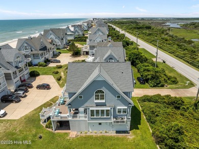 This exquisite, fully furnished oceanfront home in the coveted