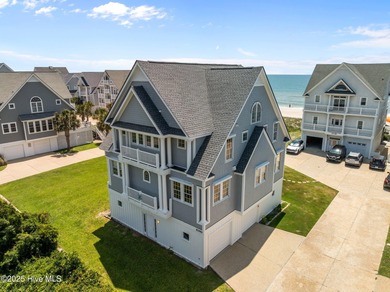 This exquisite, fully furnished oceanfront home in the coveted