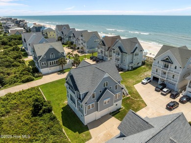 This exquisite, fully furnished oceanfront home in the coveted