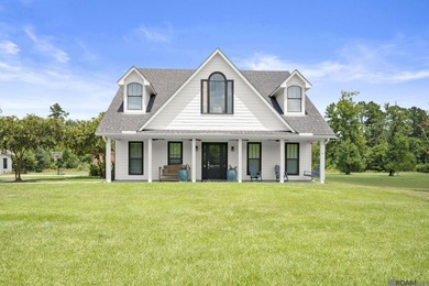 Welcome to your dream retreat in Greenwell Springs! Priced below