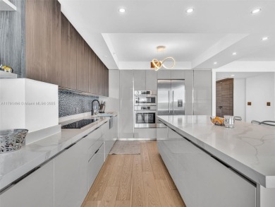 This exceptional residence showcases sweeping views of the ocean