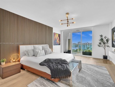 This exceptional residence showcases sweeping views of the ocean