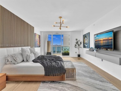 This exceptional residence showcases sweeping views of the ocean