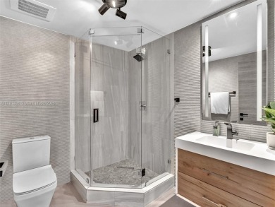 This exceptional residence showcases sweeping views of the ocean