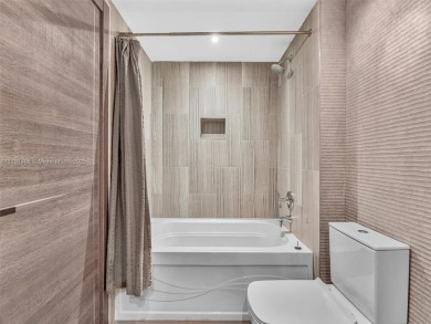 This exceptional residence showcases sweeping views of the ocean