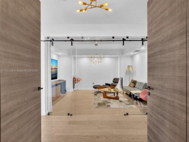 This exceptional residence showcases sweeping views of the ocean