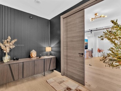 This exceptional residence showcases sweeping views of the ocean