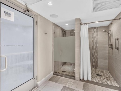 This exceptional residence showcases sweeping views of the ocean