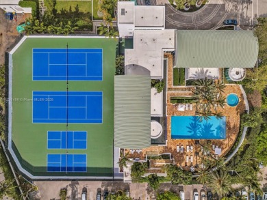 This exceptional residence showcases sweeping views of the ocean