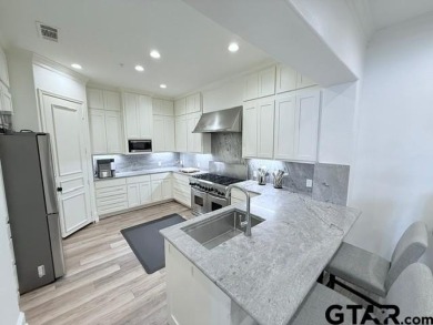 Updated kitchen and bathrooms!  Welcome to refined luxury living