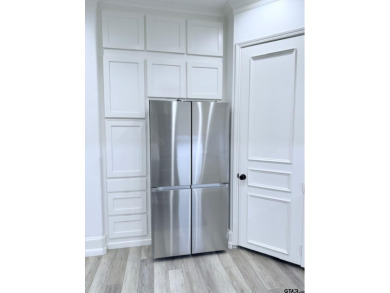 Updated kitchen and bathrooms!  Welcome to refined luxury living