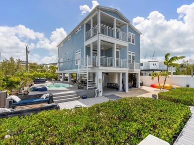 Tropical Luxury meets Coastal Living in the heart of Key Largo!