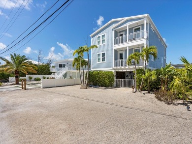Tropical Luxury meets Coastal Living in the heart of Key Largo!