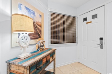 This move-in ready, updated two-bedroom, two-bath condo features