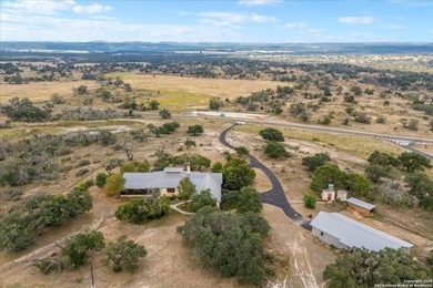 Perched atop a private hilltop with sweeping 180-degree Hill