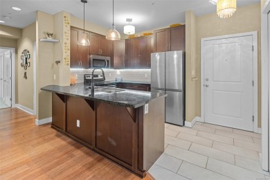 Serene ground level corner unit steps to the Royal Colwood Golf