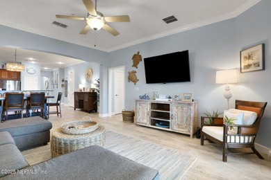 Coastal charm abounds from the moment you step inside this