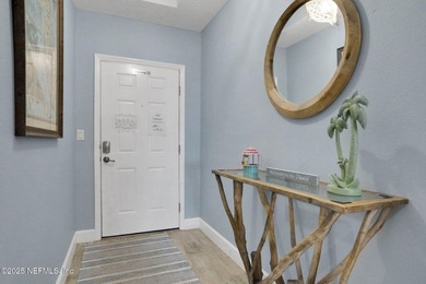 Coastal charm abounds from the moment you step inside this